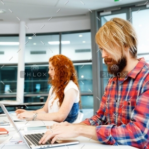 demo-attachment-134-two-co-workers-working-together-PPVW2LA
